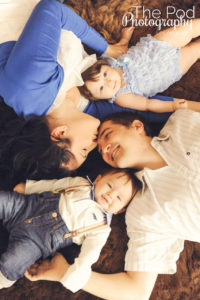 Family-Photography-Marina-Del-Rey-Laying-Kiss-The-Pod-Photography