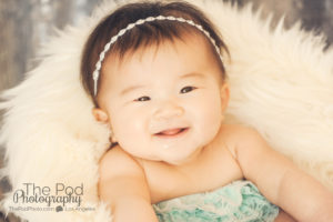 Best-Baby-Photographer-Los-Angeles-Smile-Six-Months-Romper-Headband-Sparkle-Bohemian