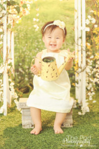 Best-First-Birthday-Photographer-One-Year-Old-Girl-Studio-Grass-Set-Sun-Glow-Garden-Spring-Styled-Brentwood