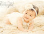 Cute-Baby-Girl-Romper-Headband-Pearls-Tummytime-Six-Months-Baby-Photographer-Brentwood-Studio
