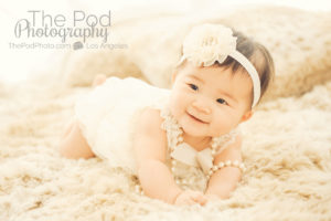 Cute-Baby-Girl-Romper-Headband-Pearls-Tummytime-Six-Months-Baby-Photographer-Brentwood-Studio