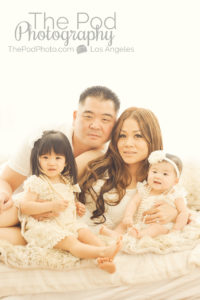 Family-Photography-Studio-Santa-Monica-Los-Angeles-Girls-White-Window-Snuggled-Bed