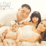 Family-Snuggled-Laying-On-Bed-Girls-Dressed-Up-Candid-Photography-Marina-Del-Rey