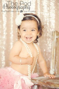 Best-First-Birthday-Cake-Smash-Photographer-Los-Angeles-Portrait-Studio-Pink-Tutu-Pearls-Headband-Cute-Baby-Girl-One-Year