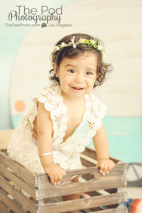 One-Year-Old-Baby-Girl-Portriats-Bohemian-Flower-Headband-Crochet-Dress-Baby-In-Bucket-Venice-Beach-Photographer