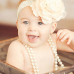 Smiling-Baby-In-Basket-Big-Girly-Headband-Pearls-Styling-Full-Service-Studio-Venice-Beach