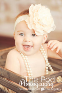 Smiling-Baby-In-Basket-Big-Girly-Headband-Pearls-Styling-Full-Service-Studio-Venice-Beach