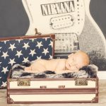 rocker baby nirvana poster newborn sleeping in sutcase