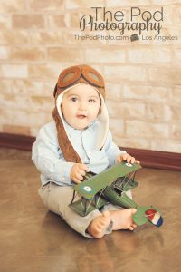Cutest-Baby-First-Year-Photographer-Manhattan-Beach-Aviator-Traveler-Set-Brick-Background-Airplane-Hat