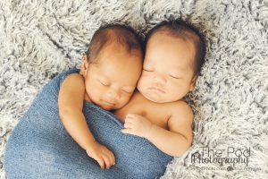 snuggled-up-newborn-twins