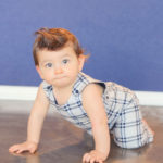 baby-boy-crawling-in-romper