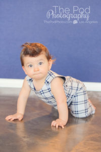 baby-boy-crawling-in-romper