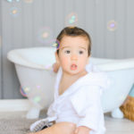 12-month-old-bubbles-in-the-tub-bathrobe-los-angeles-photographer