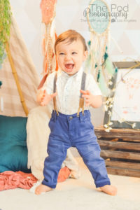 12-month-milestones-baby-standing-up-alone-cute-boho-photography-set