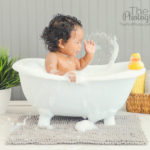 splash-in-tub-min-clawfoot-bathtub