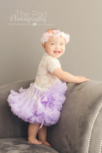 standing-up-child-at-photo-studio-in-tutu