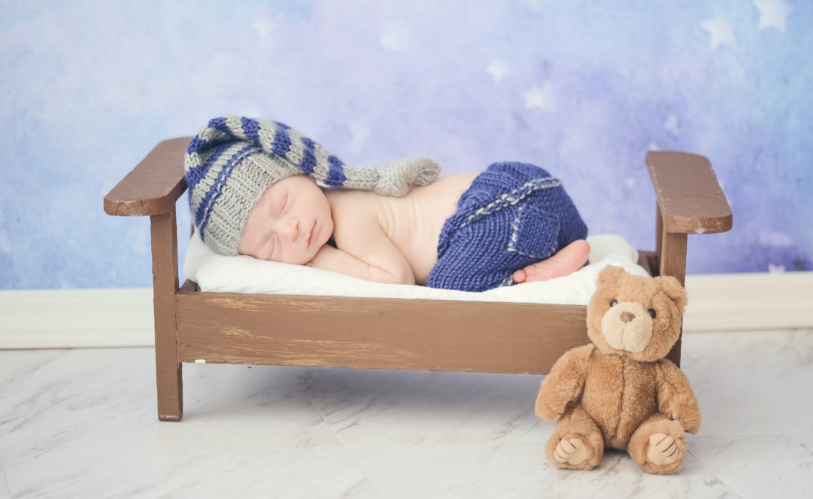 infant-sleeping-in-tiny-bed