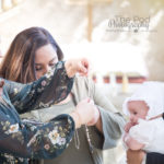 Godparents give baptism gift to niece