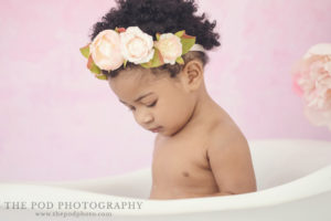 baby playing with bubbles