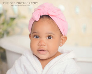 cute-one-year-old-baby-girl-in-bathrobe