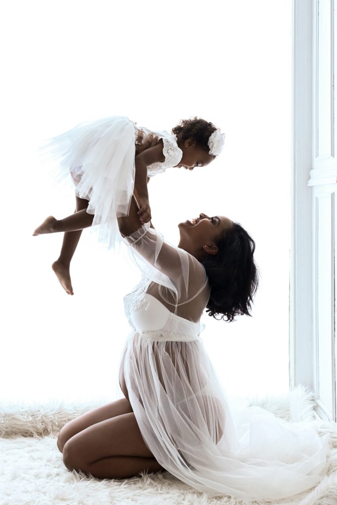 This mommy to be just rocked her maternity session with plain white saree.  Can't get gorgeous than this. Looking for Best Maternity Phot