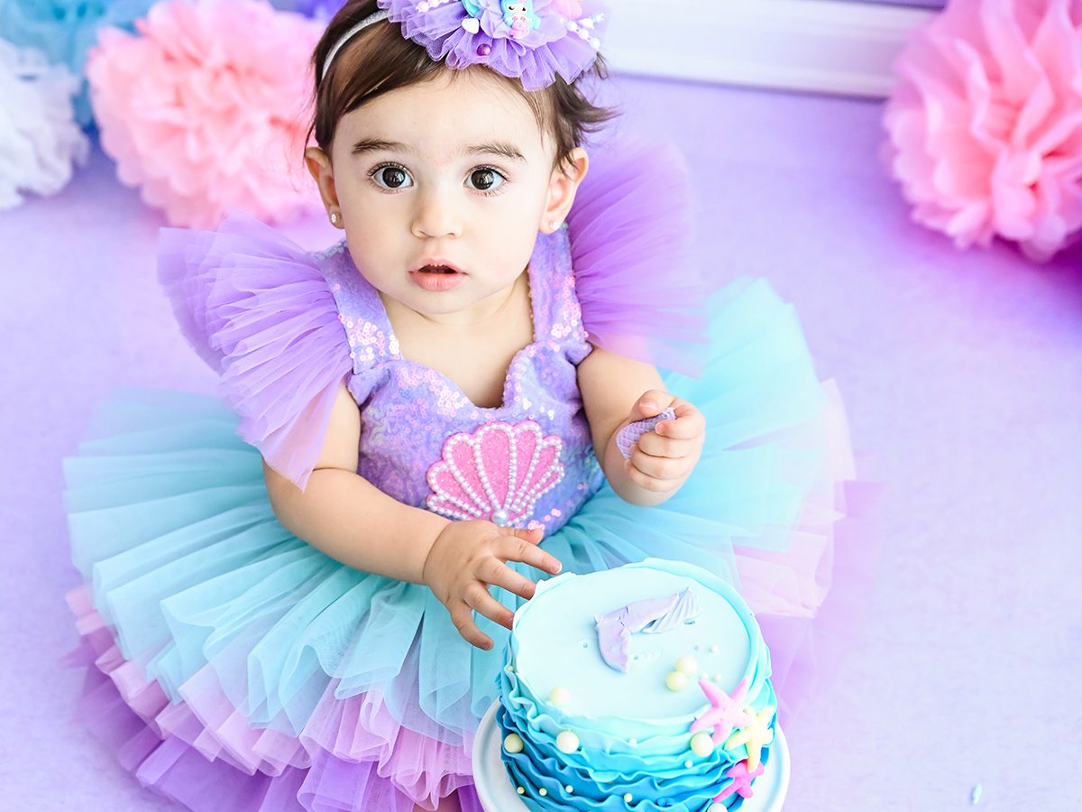 Mermaid First Birthday Cake Smash and Splash Portrait Session