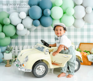 first-birthday-photoshoot-vintage-cake-smash-vintage-toy-car-culver-city
