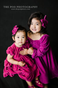 sisters-hot-pink-dresses-sibling-portrait