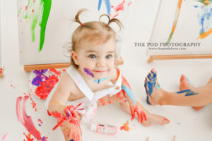 baby-covered-in-paint-the-pod-photo