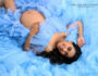 maternity-portrait-blue-tulle-gown-lying-the-pod-photography