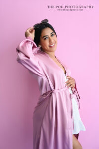 pink-robe-maternity-portrait-smiling-the-pod-photography