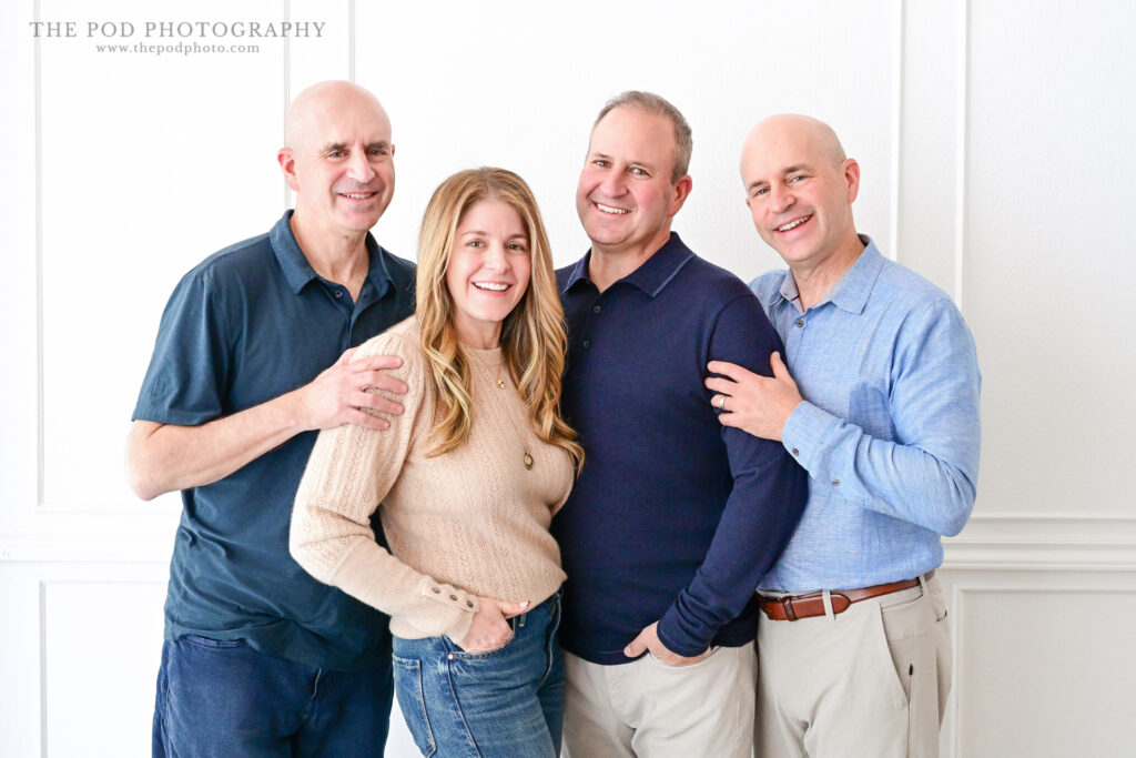 adult siblings pose together for the first time in years for a family photo!