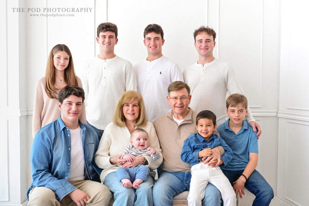 Grandparents with all of their grandchildren in a family portrait at a Los Angeles studio
